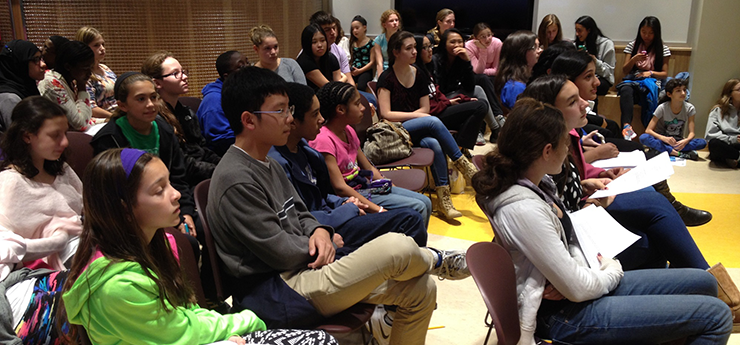 Teens sitting and listening during TAB meeting