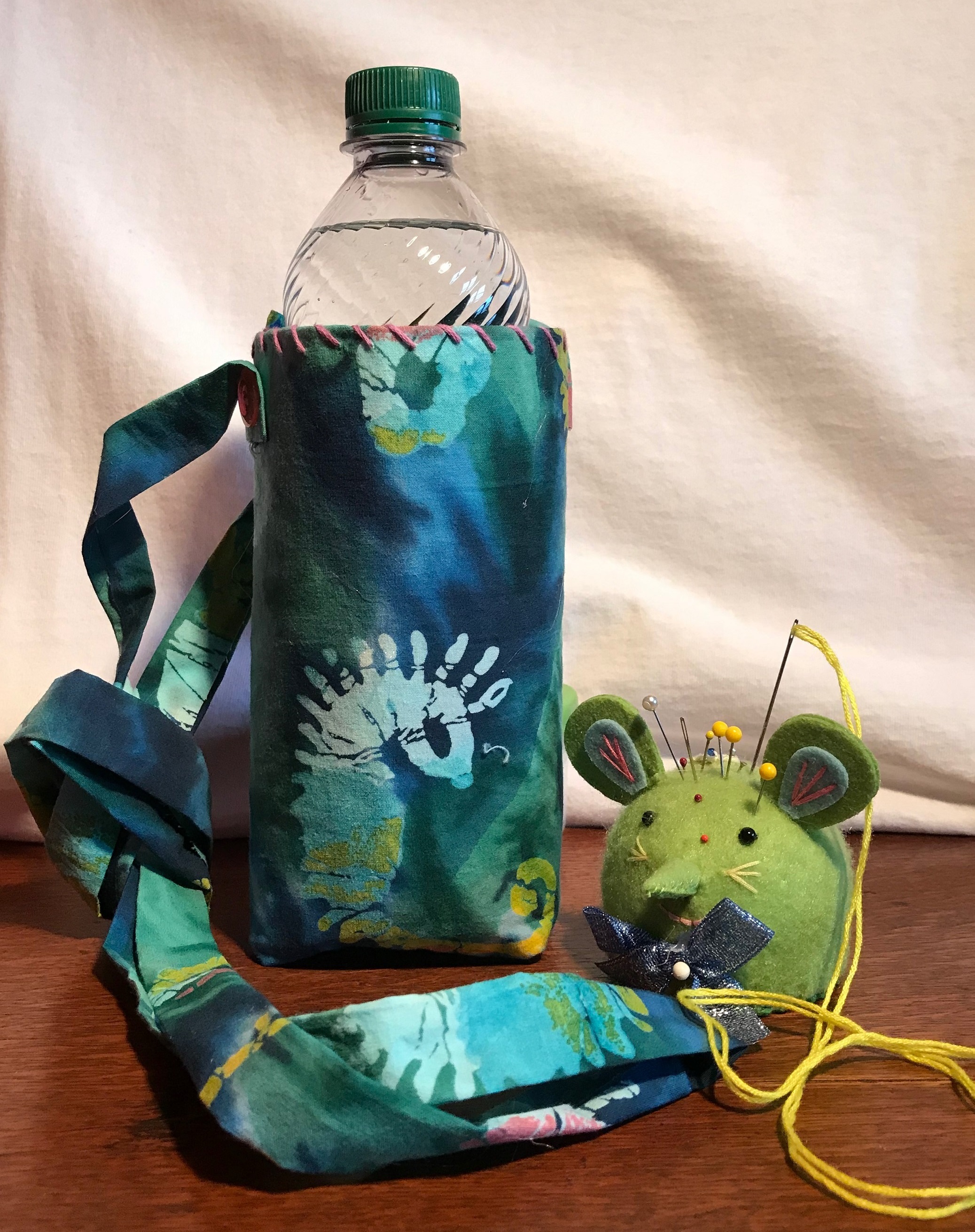 Upcycled water bottle holder