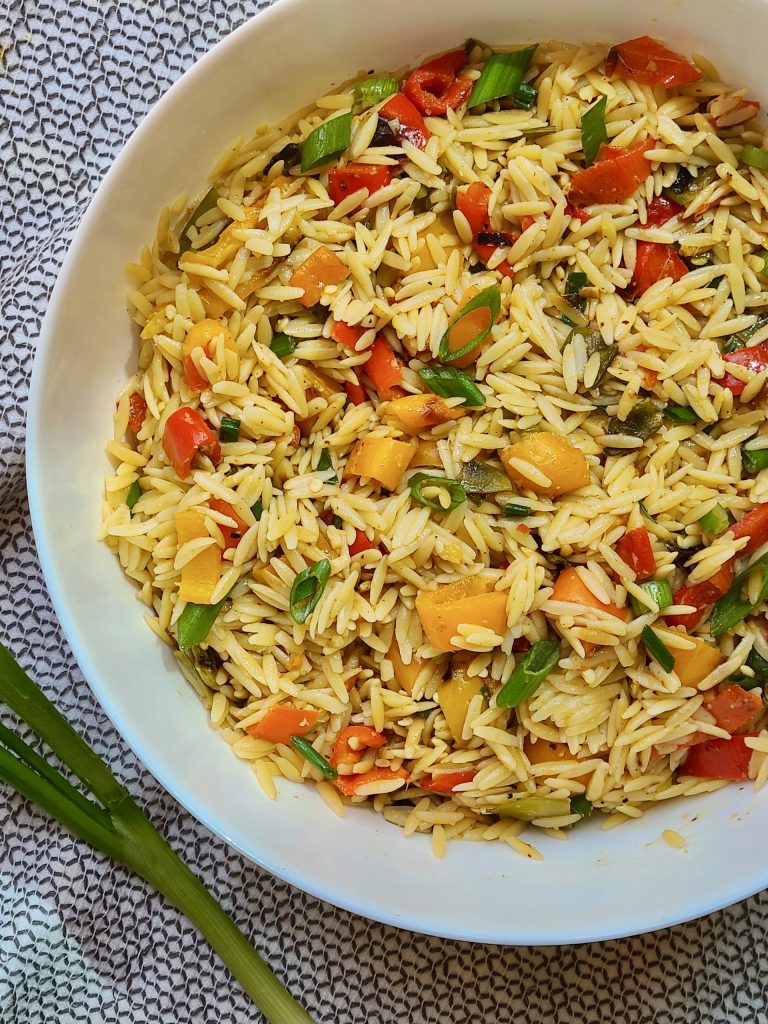 Photo of a bowl of Asian Chicken Orzo Salad.