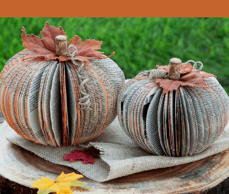 Photo of two pumpkins created from upcycled books.