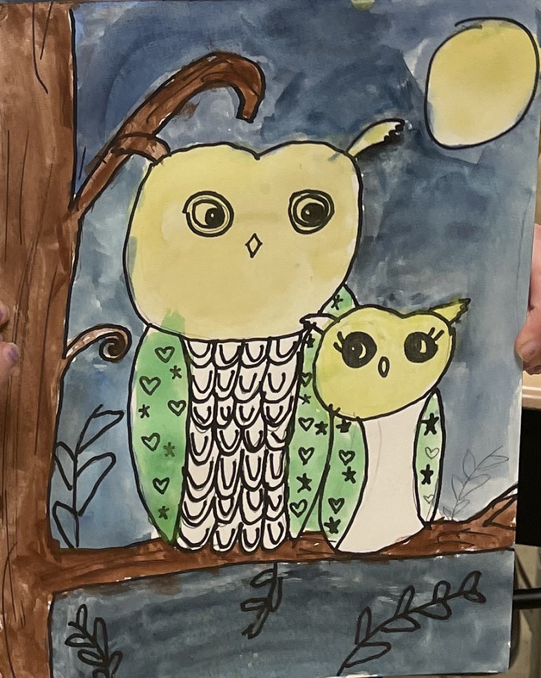 Horned owls in tree