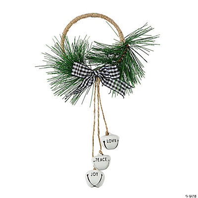 An image of a rope ring adorned with holiday greenery and three bells.
