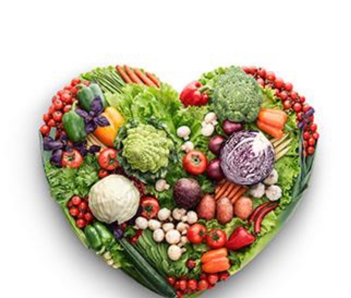 A photograph of vegetables arranged in the shape of a heart.