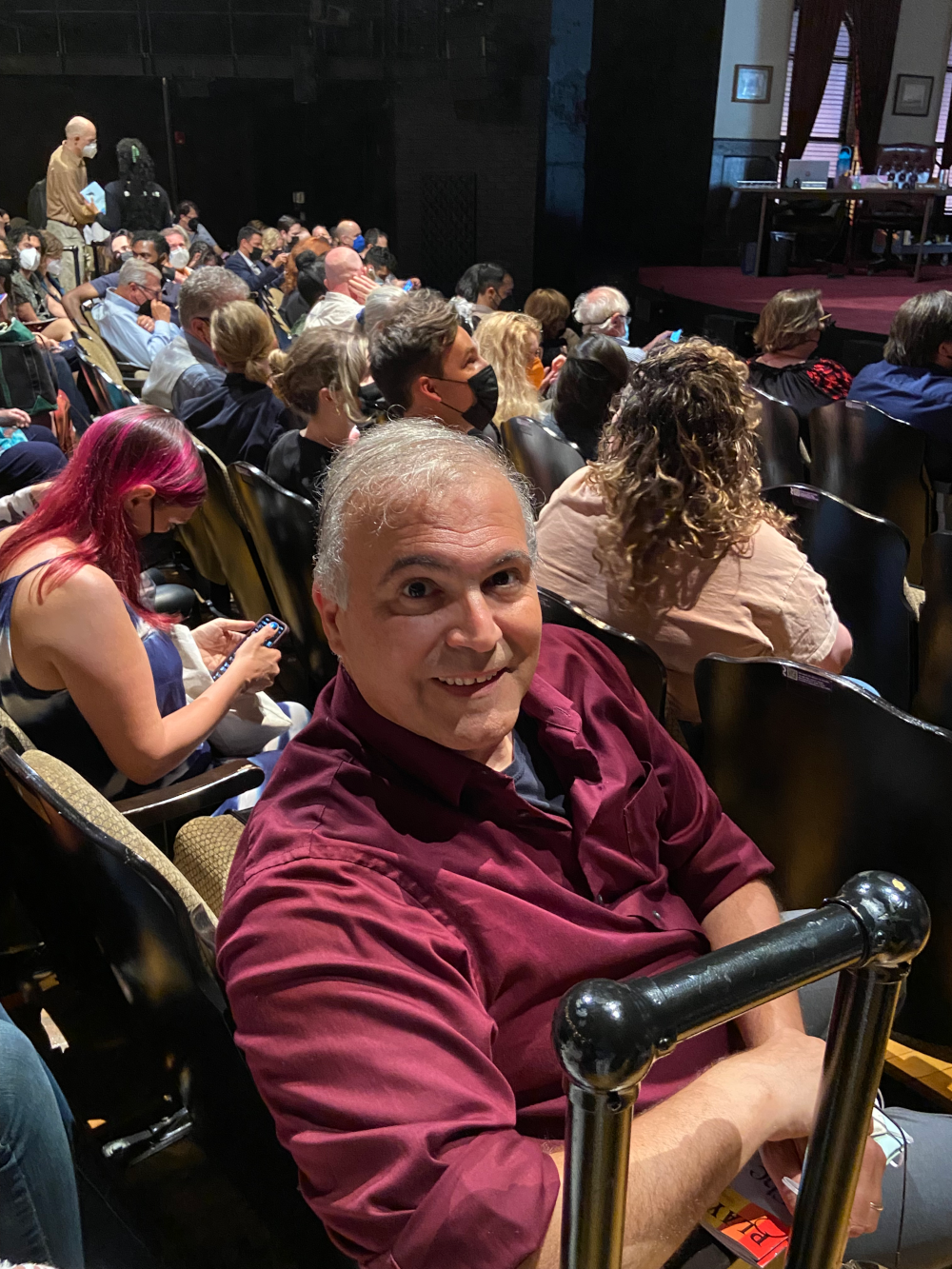 A color photo of author Robert Viagas sitting in a theater audience.