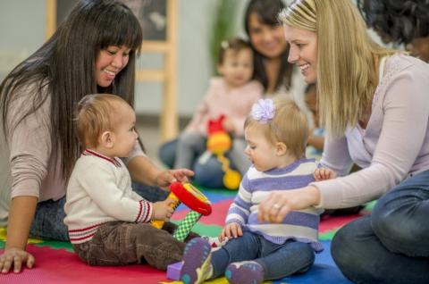 Parents and children playing