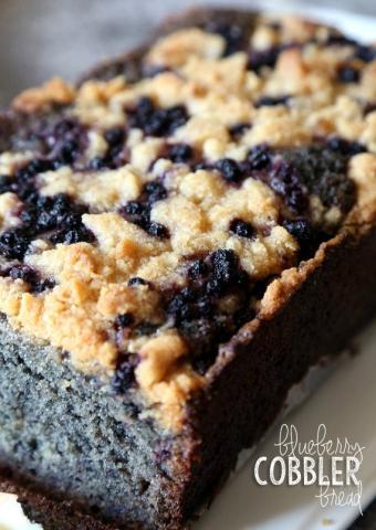 A photo of a loaf of Blueberry Cobbler Bread.