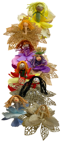 A color photo of fairy dolls made from yarn and other materials.