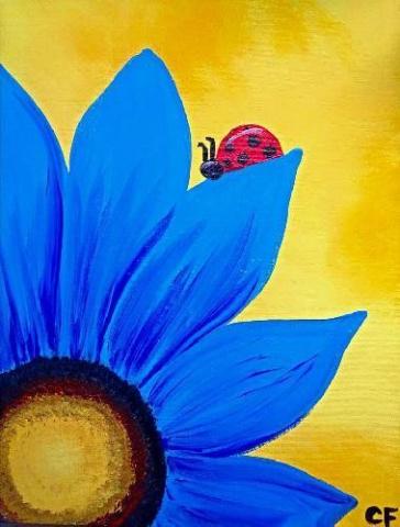 Blue flower with ladybug