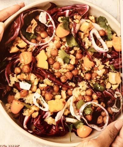 A color photo of a fall salad made with radicchio, squash and chick peas.