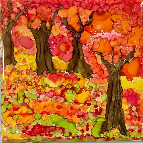 An image of autumn trees created using alcohol paints.