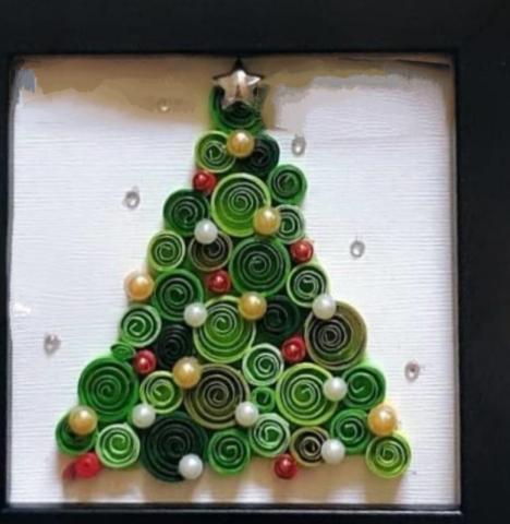 A Christmas tree made using the technique of quilling.