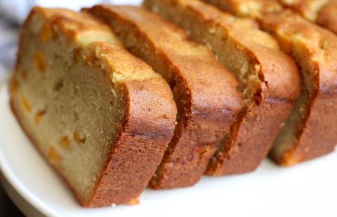 A photo of slices of peaches and cream bread.