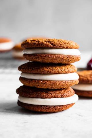 A color photo of a stack of three whoopie pies.