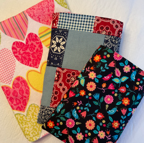 A photo of several fabric book sleeves.