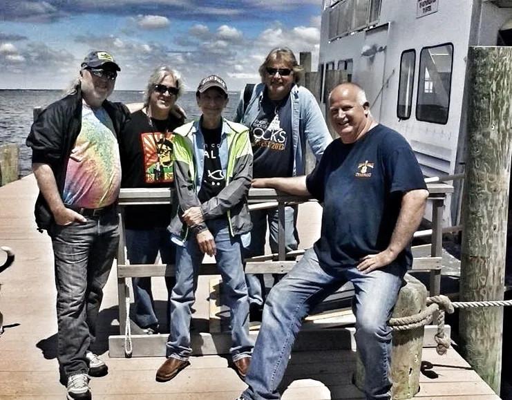 A color photo of the members of the Ed Travers Band.