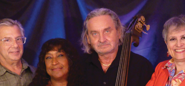 A color photo of the four members of Sympatico Jazz.