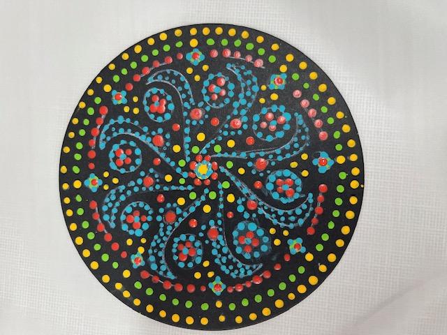Photo of a mandala created using the technique of dotting.