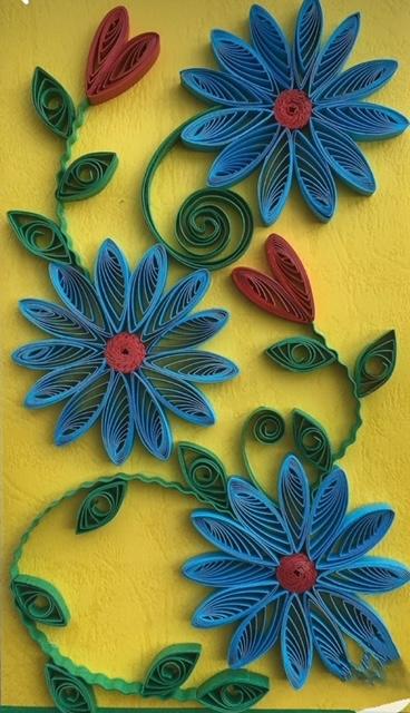 A photo of quilled summer flowers.