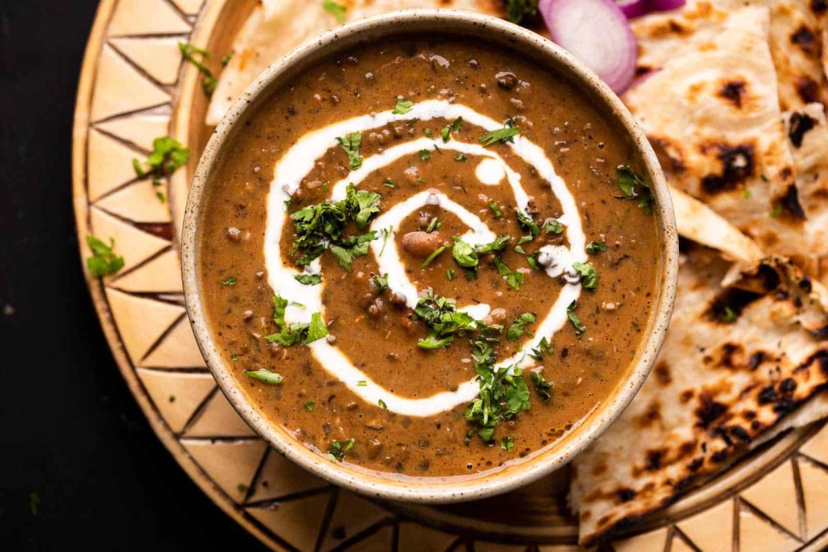 A photo of a bowl of dal makhani.